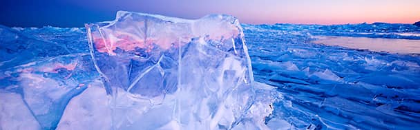 A freshwater ocean that defies winter with its vastness.