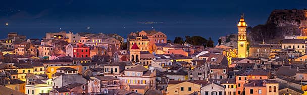 admire the breathtaking beauty of Corfu at night in Greece